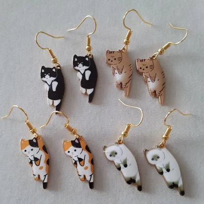 Brincos de Gato Pendentes — Motivo Específico da Raça
